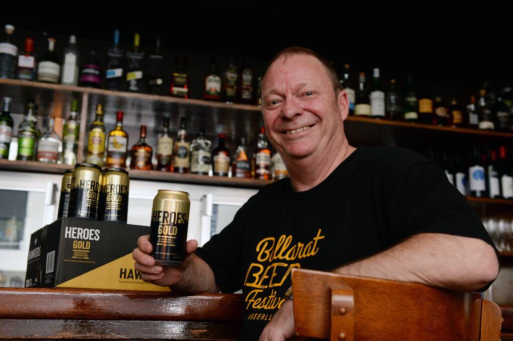 RELIEF: Ballarat Beer Festival organiser Ric Dexter holding a can of the special edition Hawkers Heroes Gold beer, which will help raise funds for bushfire releif. Picture: Kate Healy.