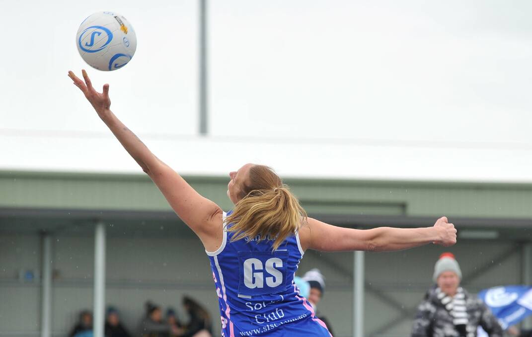 STRETCH: Sunbury goaler Amanda Cusack reaches out to secure the ball for the Lions in its four goal win over Lake Wendouree. Picture: Lachlan Bence.