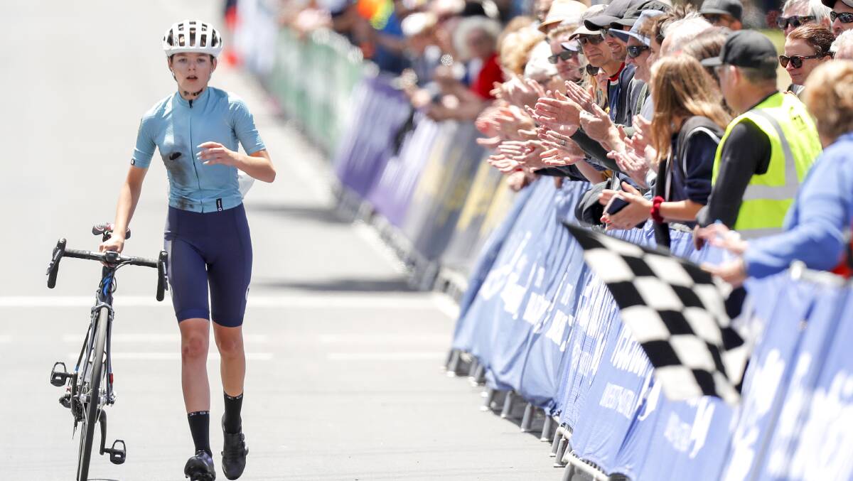 PUSHING THROUGH: Francesca Sewell pushes her bike towards the finish line. Picture: Dylan Burns.