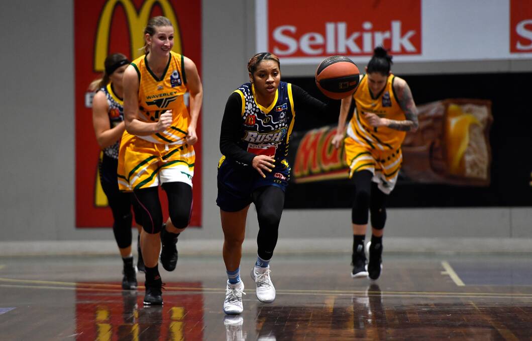 PACE: Jenkins regularly led the Rush in the open court, leading her to a 33 point, 10 assist performance. Picture: Adam Trafford.