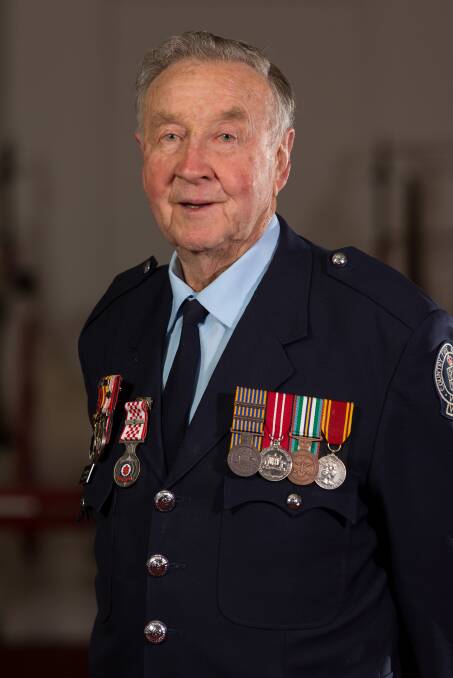 AWARD: Stan Kneeshaw accepts his 65 years of service medal at this years Ballarat Fire Brigade awards night.