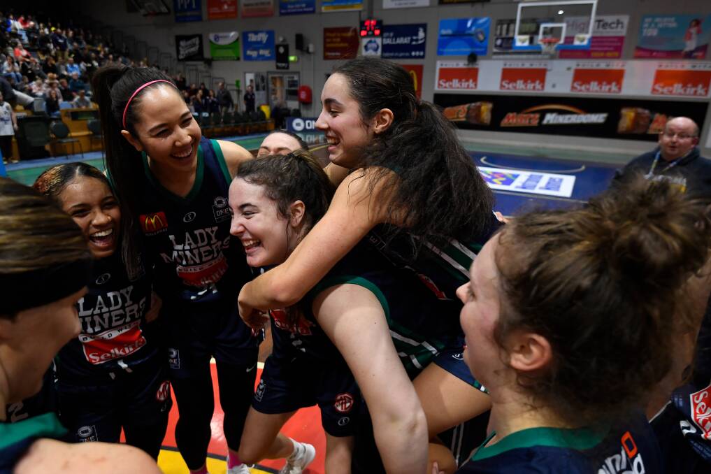 ALL SMILES: The Rush celebrate its win over the Melbourne Tigers in its last ever game inside the Minerdome. Picture: Adam Trafford.