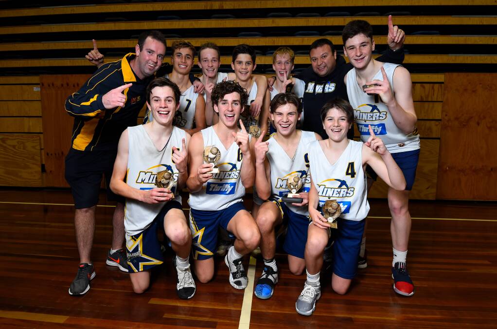 WINNERS ARE GRINNERS: The Ballarat Miners under-16 team following their A grade grand final win in the Ballarat Basketball Tournament. Picture: Adam Trafford.