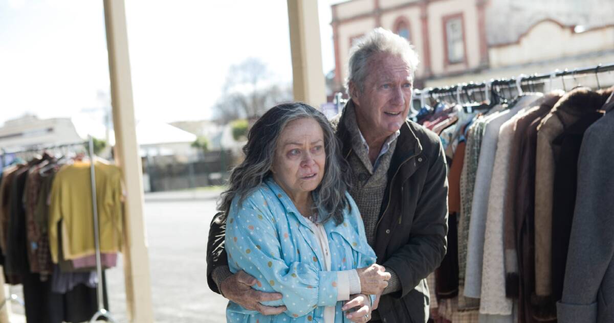 ACTING ROYALTY: Jacki Weaver and Bryan Brown run through the streets of Clunes. Picture: Stan.