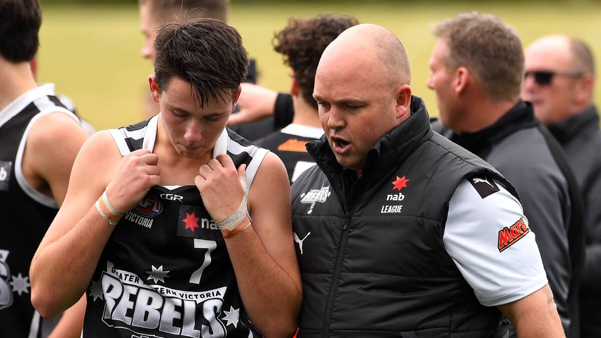 LEADERSHIP: Coach Mark Greig gives some encouragement to Mitchell Martin. Picture: Adam Trafford.