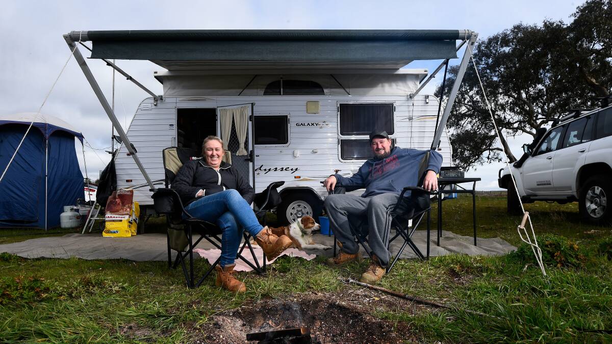RELAX BY THE WATER: Teesdale locals Nikki and Dale Herman along with their Border Collie, Cookie, enjoyed a long weekend away at Lake Burrumbeet. Picture: Adam Trafford.