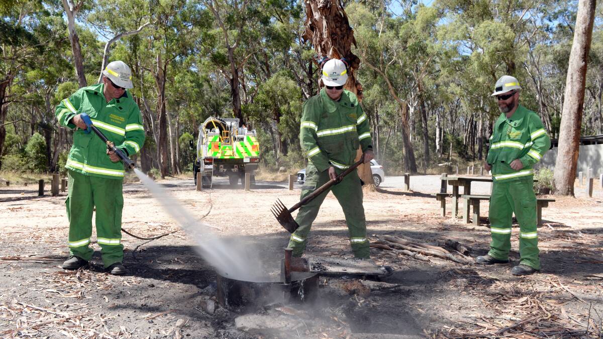 SAFETY: Forest Fire Management rangers Dale Malcolm, Nick Day and James Hearn at Slaty Creek campground in Creswick. Picture: Kate Healy.