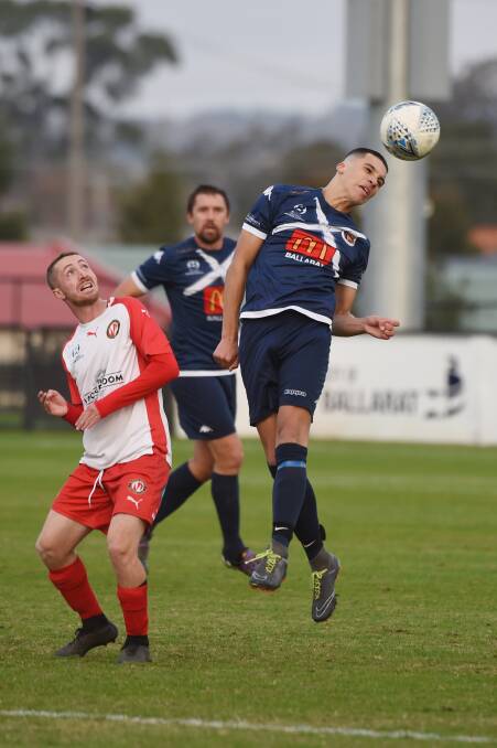 ATHLETIC: Jalil Regague heads the ball for Ballarat City. Picture: Kate Healy.