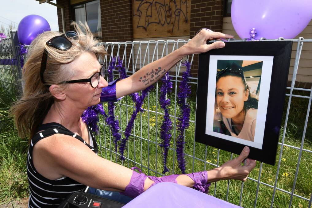 REST IN PEACE: Jodie Campbell (pictured above) and a group of Dannyll Goodsell's friends pay tribute to her with a memorial outside her Mount Pleasant home while her funeral took place in New South Wales. Picture: Lachlan Bence