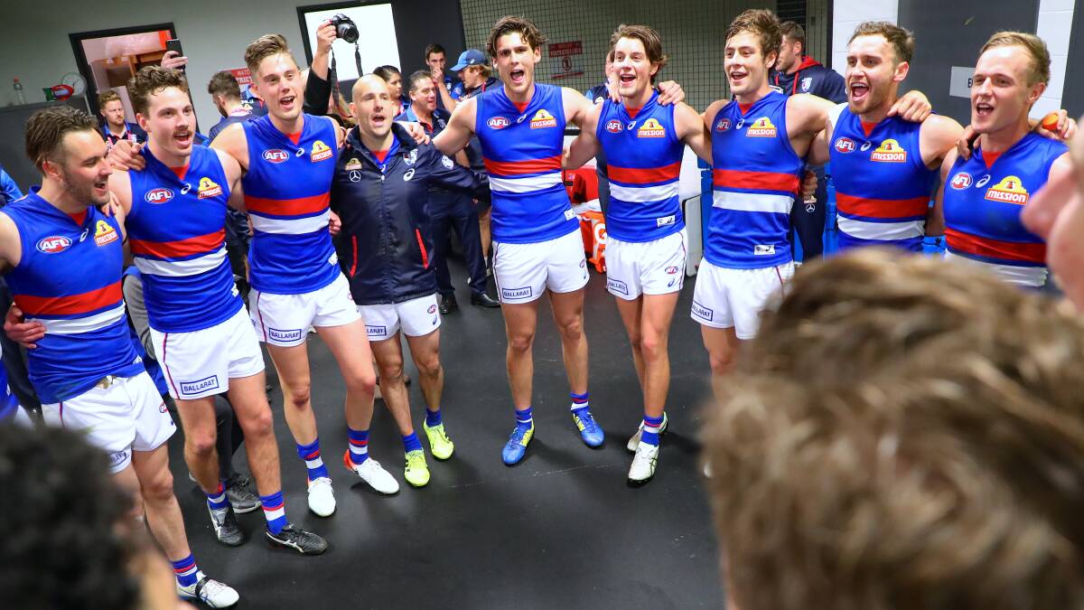 WINNERS ARE GRINNERS: The Western Bulldogs celebrate after its 61-point win over GWS. Picture: David Gray.