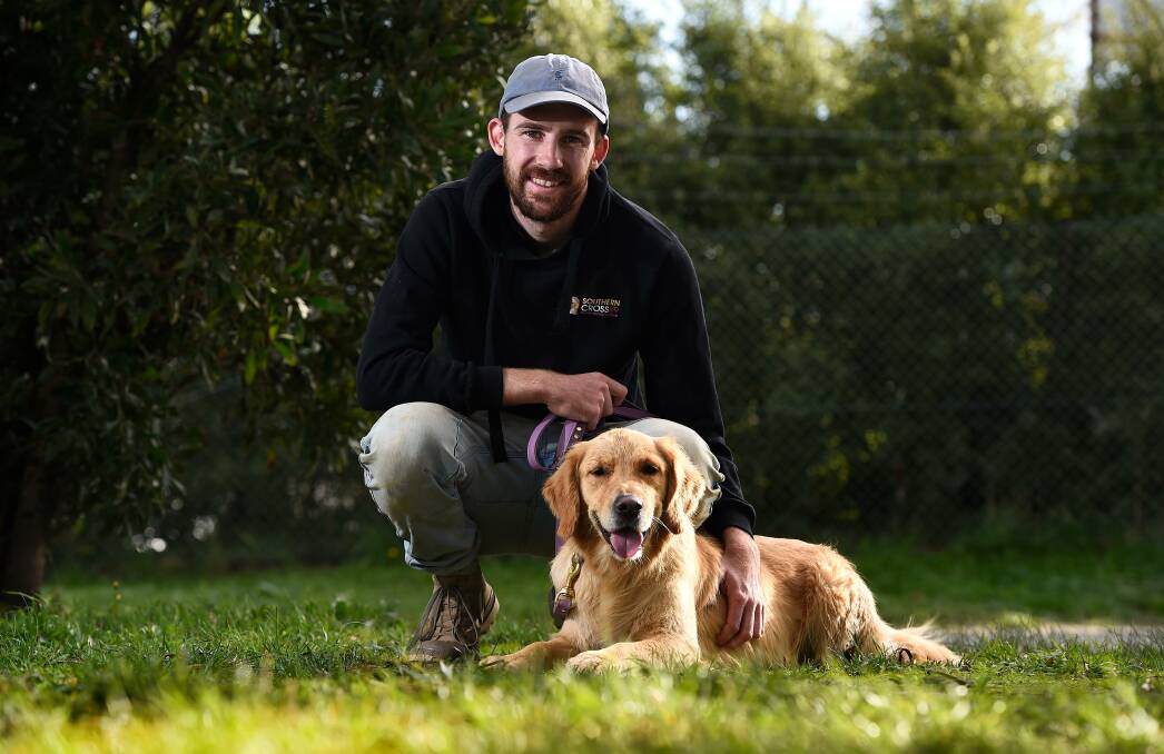 MAN'S BEST FRIEND: Southern Cross K9 trainer Jamie Huggett said pets can be great for mental health. Picture: Adam Trafford.