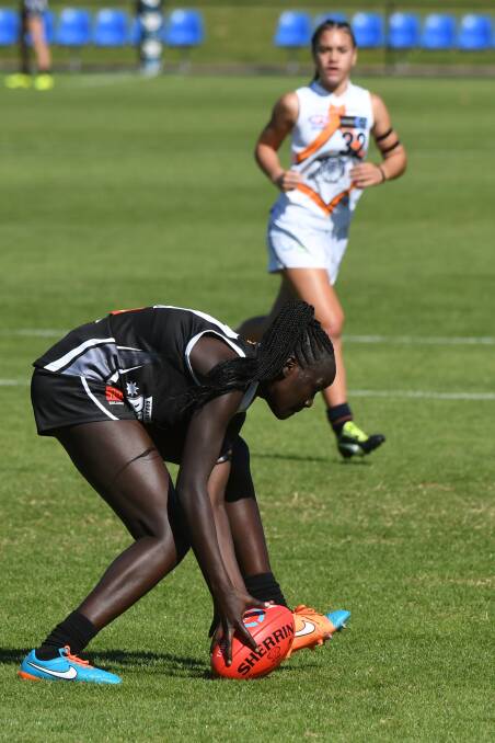 RETURN: Nyakoat Dojiok will return to the Rebels lineup for Saturday's game. Picture: Kate Healy