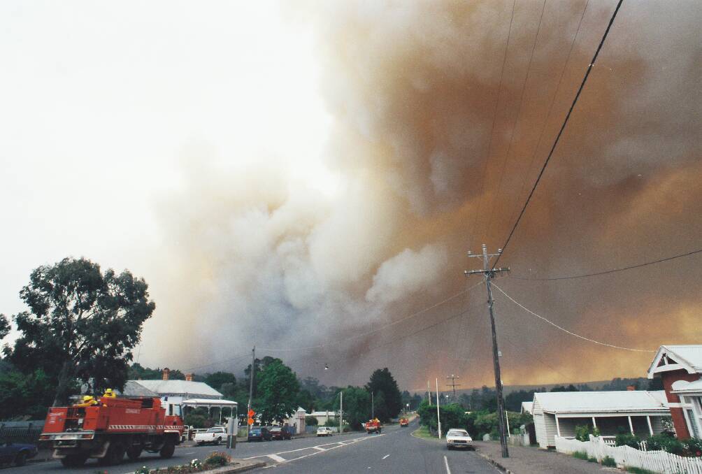 HORROR: Smoke billowed over the main street of Linton during the 1998 fires that took the lives of five firefighters. 