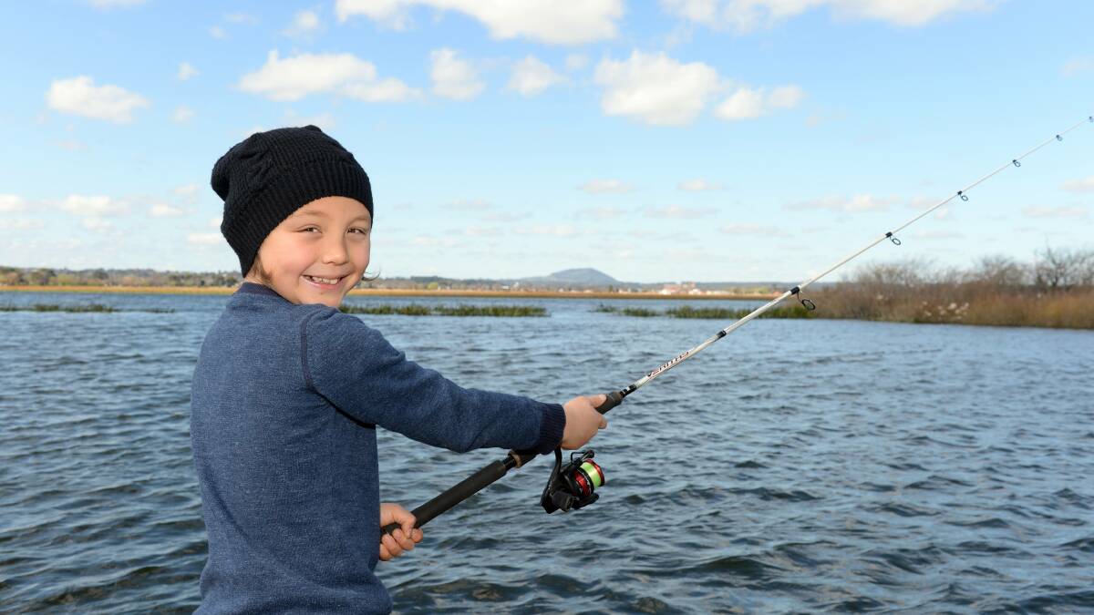 CAST THE LINE: Young Daylesford fisherman Finn Masuda is set to release two years worth of fishing videos online to help teach other children how to fish. Picture: Kate Healy.