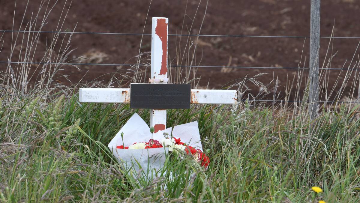 NEVER FORGOTTEN: A roadside memorial to Tracey Howard installed by her friends where her body was found. Picture: Lachlan Bence.
