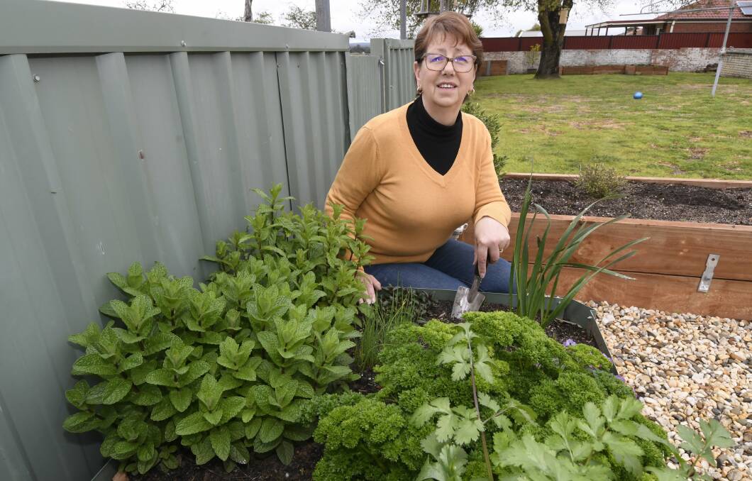 GREENERY: Elizabeth van Beek, Executive Officer of the Ballarat Agricultural & Pastoral Society, shows off her herb garden. Picture: Lachlan Bence.
