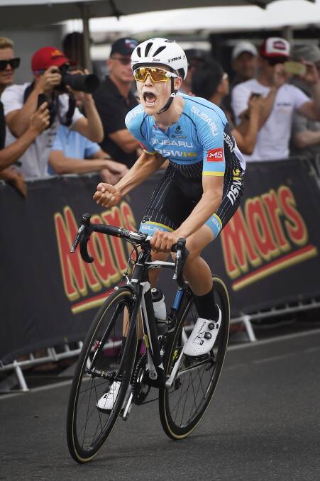 PURE EMOTION: Sam Jenner celebrates his Under 23 Road Race win in 2017 after he crosses the finish line. Picture: Luka Kauzlaric