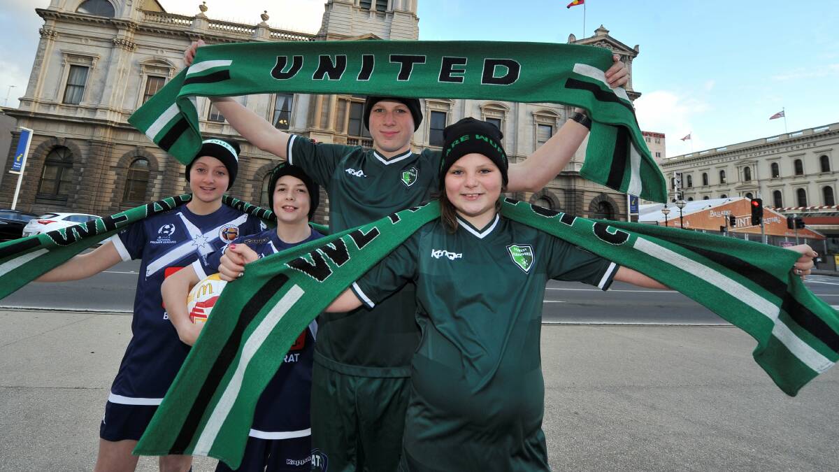 SHOW YOUR COLOURS: Cobi Wilbert Max Bedggood from Ballarat City and Koby Anstis and Tiarlah Anstis in Western United colours are all excited at the prospect of potential A-League games in Ballarat. Picture: Lachlan Bence.
