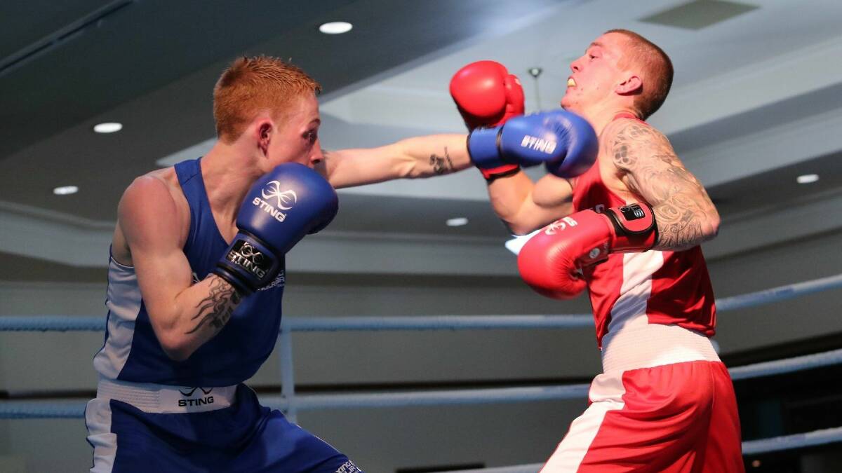BATTLE: Jack Denahy, left, is currently in Russia competing in the 2019 AIBA world boxing championships. 
