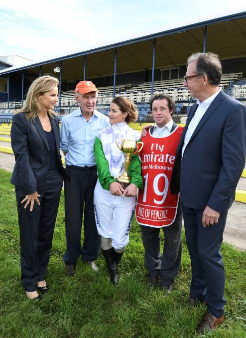 GIDDY UP: The Payne family (Paddy, Michelle, and Stevie) flanked by the director Rachel Griffiths, and producer Richard Keddie of an upcoming film about their Melbourne Cup triumph. Picture: LACHLAN BENCE