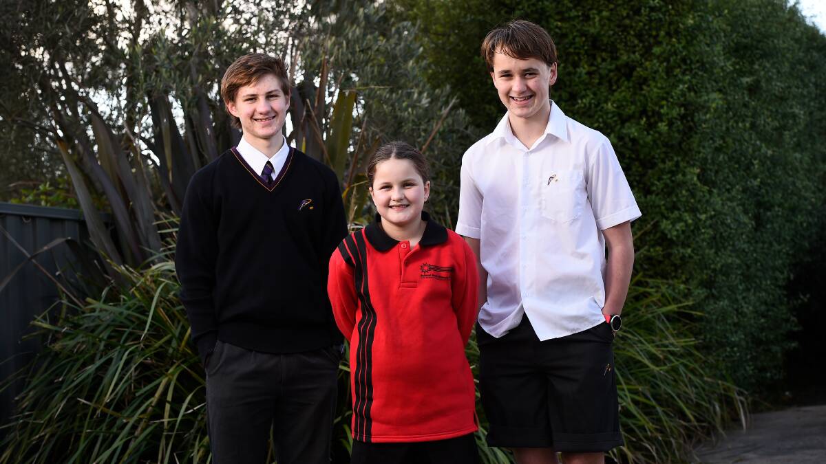 SIBLINGS: Landon, Lucy and Zander Coulter are all set to return to school for the first time since COVID-19 restrictions hit. Picture: Adam Trafford.