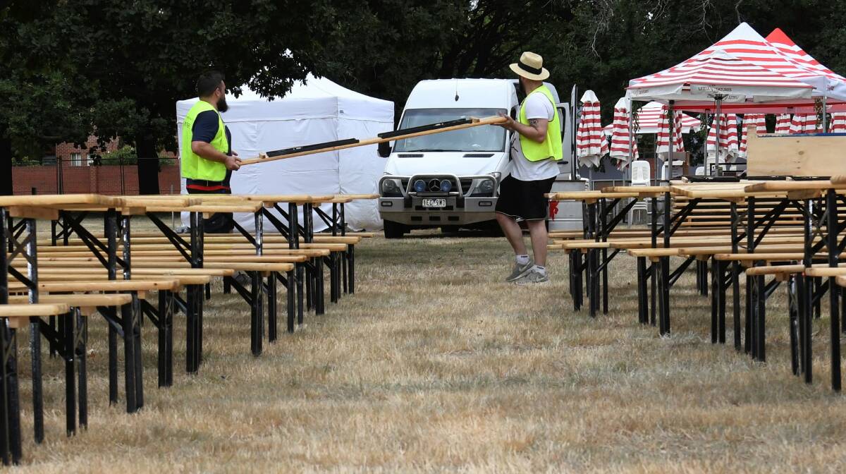 ALMOST TIME: Staff begin putting the final touches on preparations for Saturday's event. Picture: Lachlan Bence.
