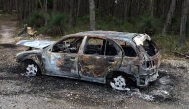 The remains of a car burnt of in the Canadian Forest on Thursday morning.
