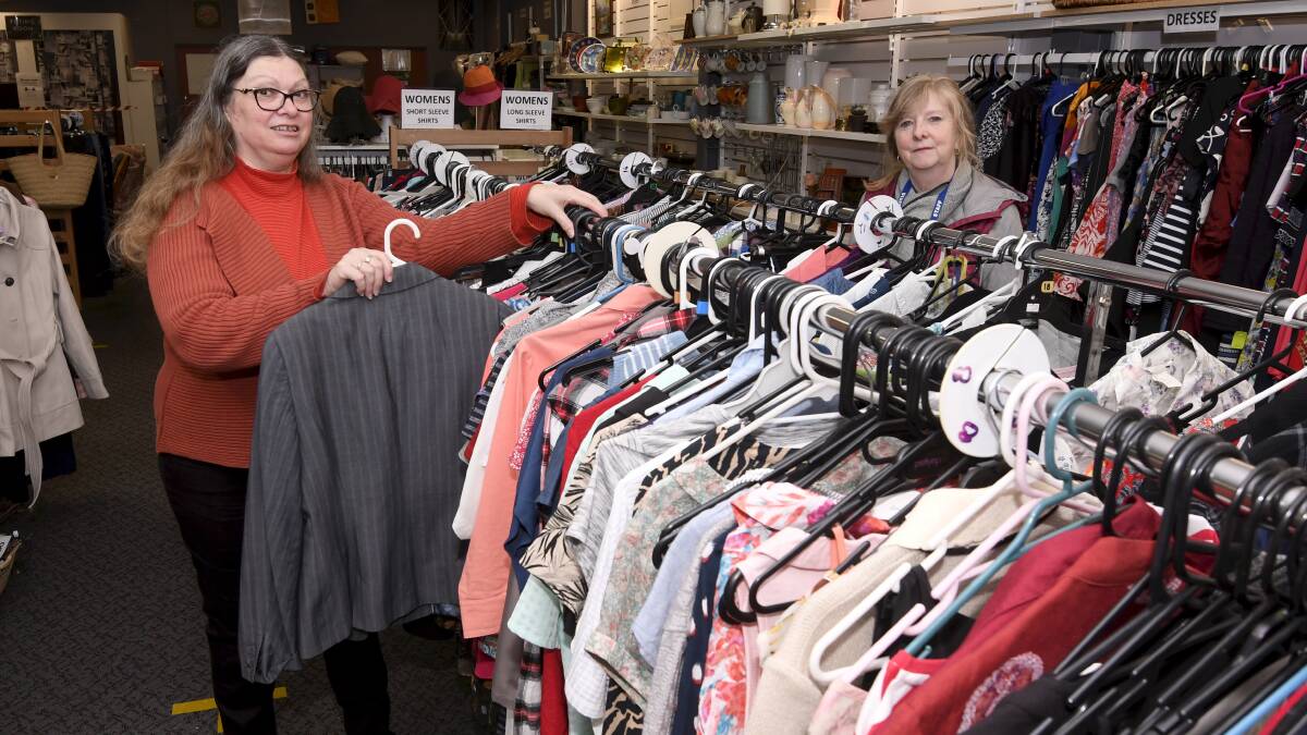 READY TO GO: Salvation Army Thrift Shop volunteer Jennie Lucas and manager Angela Kelly are excited to be able to re-open their doors. Picture: Lachlan Bence.