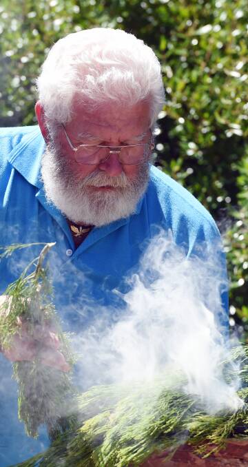 Indigenous focus: Uncle Bryon Powell conducts a smoking ceremony as part of MADE's 162nd Eureka Day celebrations on Saturday afternoon.  Picture: Kate Healy. 
