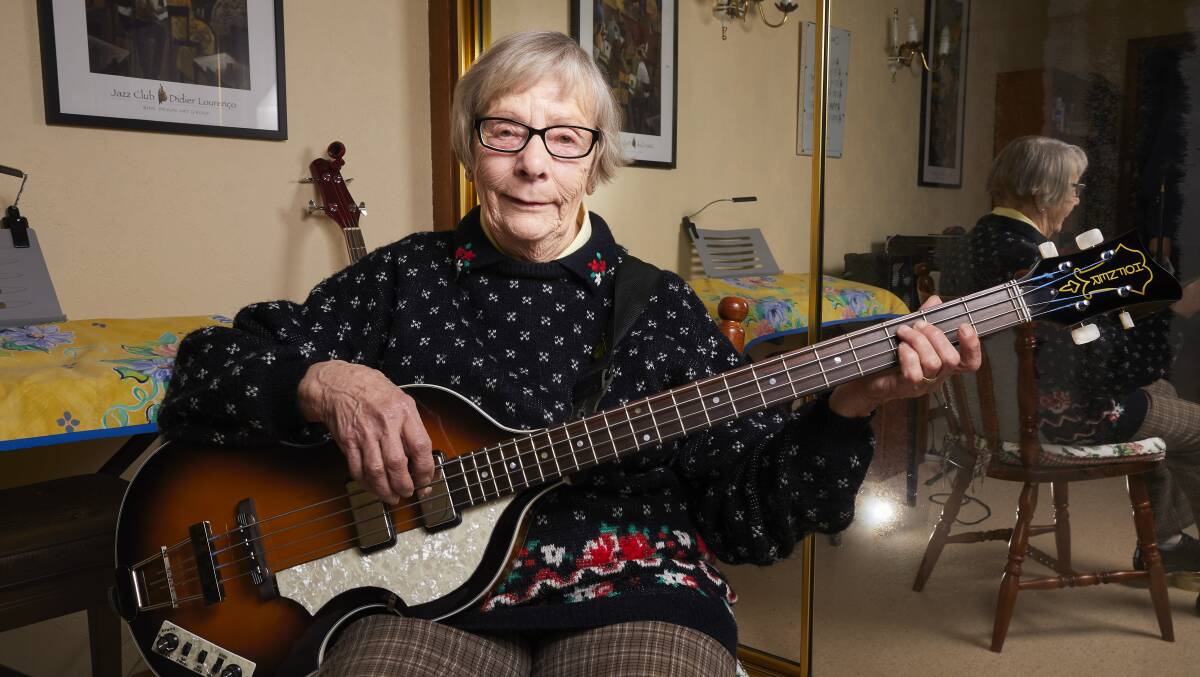 A new challenge: Barbara Preston has been playing cello for 10 years and on her 80th birthday decided it was time to tackle the bass guitar. Picture: Luka Kauzlaric 