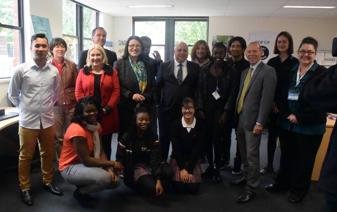 Youth Affairs Minister Jenny Mikakos and Treasurer Tim Pallas (centre) with Wendouree MP Sharon Knight, Buninyong MP Geoff Howard and participants in the Centre for Multicultural Youth.  
