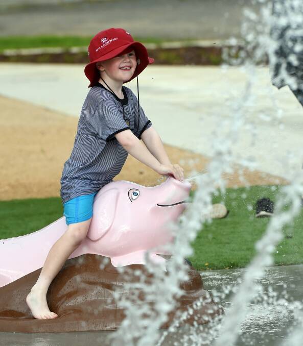 Left to swelter: Six-year-old Creswick resident Jack Petch made the most of the new splash park on Monday before vandals rendered it unusable.  Picture: Kate Healy. 