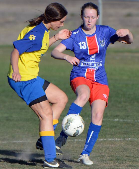 Dominant: Sebastopol's Emelia Williams competes for the ball with Vic Park Blue's Isabel Unwin in the Vikings' convincing 8-1 victory at on the weekend.  Picture: Kate Healy.