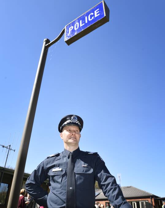 Standing proud: Sergeant Nathan Gardiner from Trentham in front of the current police station at the celebration of 150 years of police presence on Friday.  Picture: Dylan Burns. 