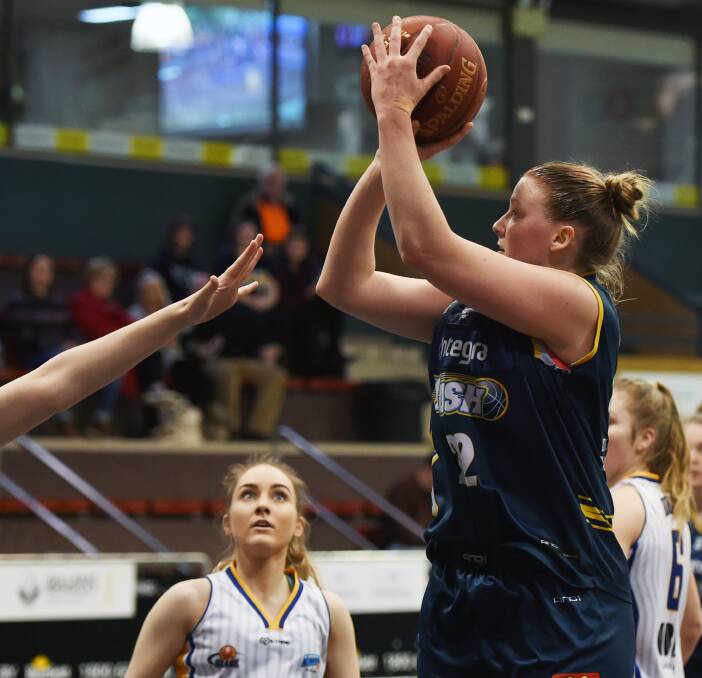 Making a splash: Ashleigh Spencer enjoyed another strong weekend on the court for the Rush, scoring 22 points against the Canberra Capitals and 18 points against the Geelong Lady Supercats.  Picture: Kate Healy. 