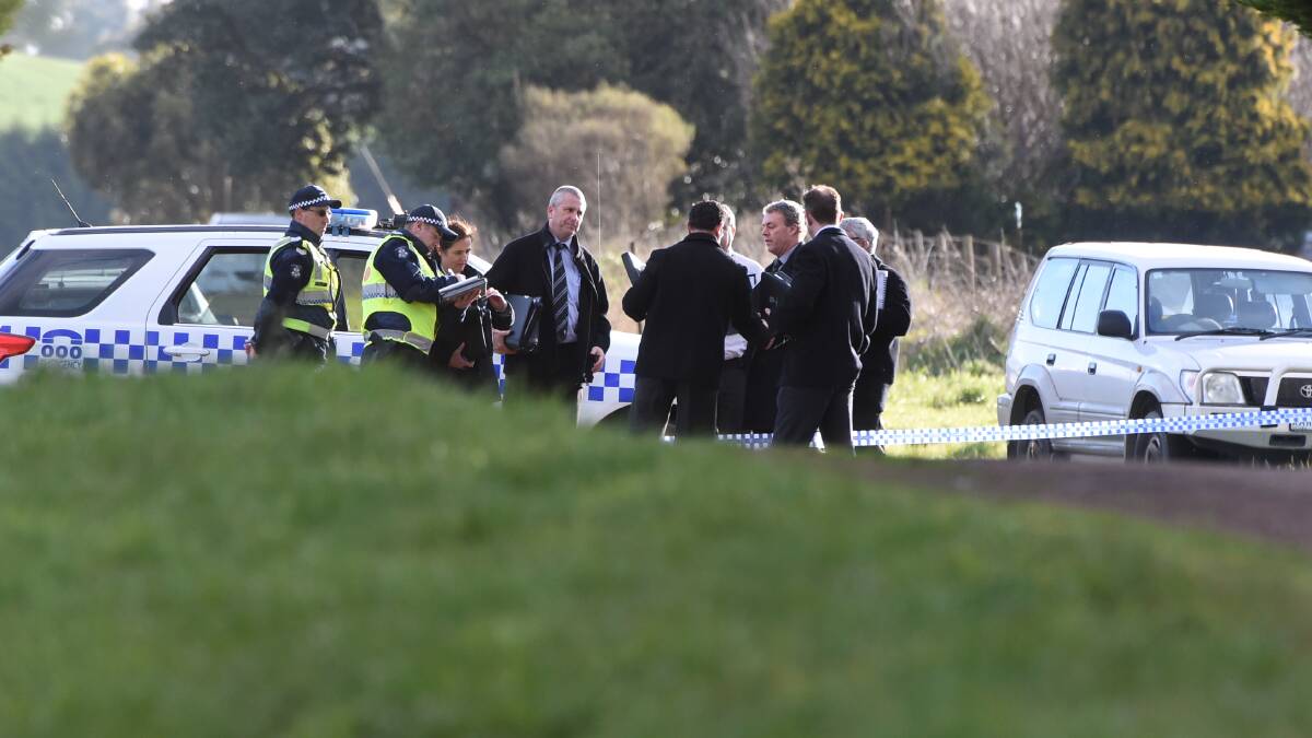 Police and investigators attend the scene of Kenneth Handford's murder in September 2015. Picture: Lachlan Bence 