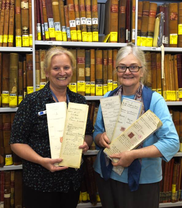 A different time: Gertie Cotterill (l) And Liz Denny of the PRV holding divorce petitions of the 1940s and 1890s. No-fault divorce laws were introduced in the 1970s.