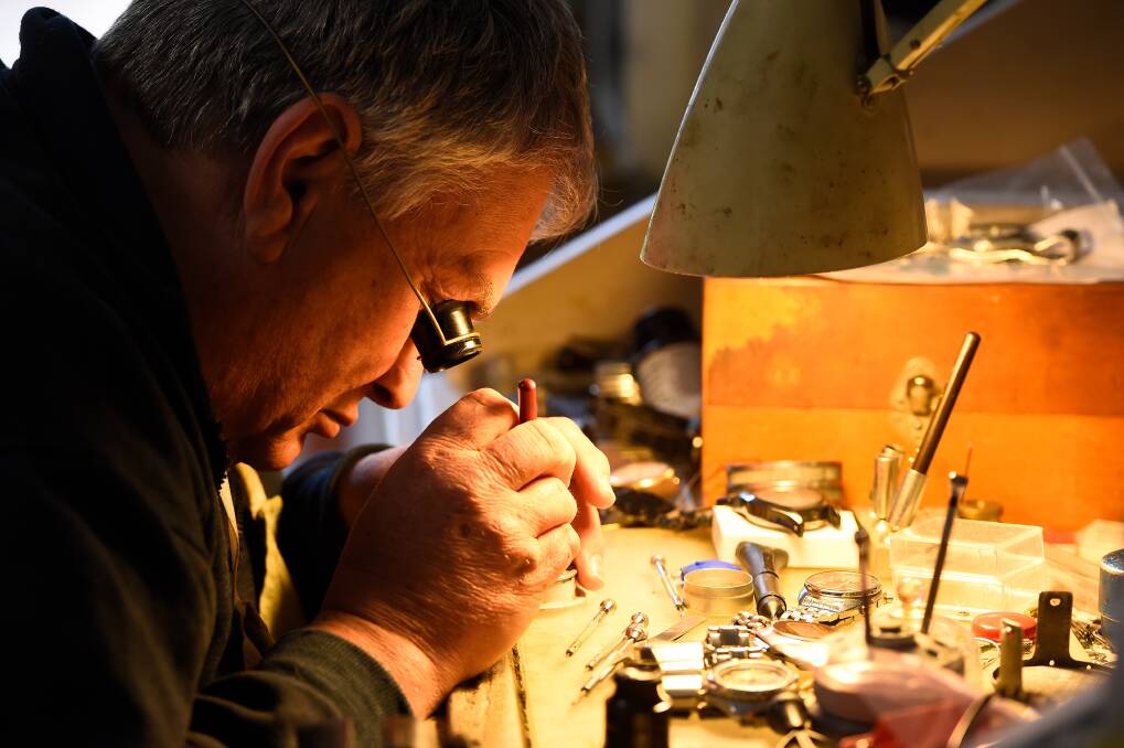 Precision and steadiness: With parts for mechanical watches becoming scarce, Bill Wood must pay careful attention to each job he works on. Picture: Adam Trafford.
