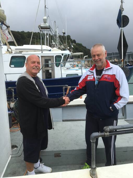 Before the journey: Rick Serier (r) with Eric Hartley, pilot of the Channel crossing vessel 'Pathfinder'.