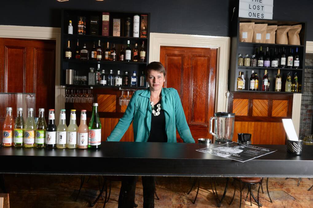 Secret history: Tara Poole in the Lost Ones bar, a former Masonic dining hall and SEC social club. Picture: Kate Healy.