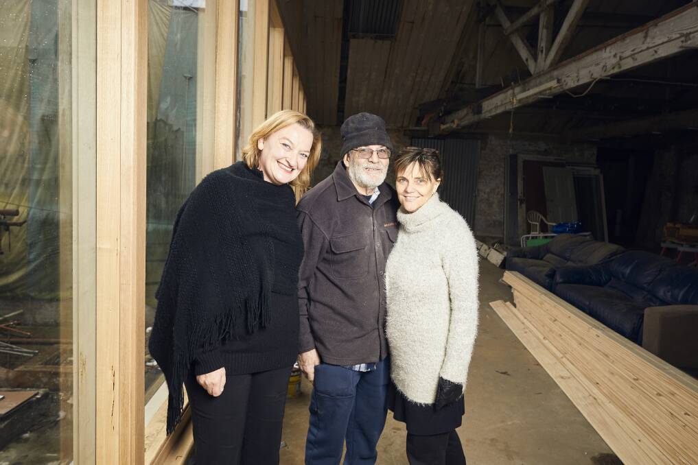 A new leaf: Julie Collins, BOAA artistic director,with Richard Perry and Megan Wahr of Urban Abstract, inside the George Farmer and Co. building now being refurbished. Picture: Luka Kauzlaric