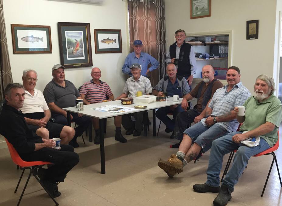 All volunteers: The Ballarat Fish Acclimatisation Society at their rooms in Wendouree. President Frank Gray is on the right. Photo: Caleb Cluff.
