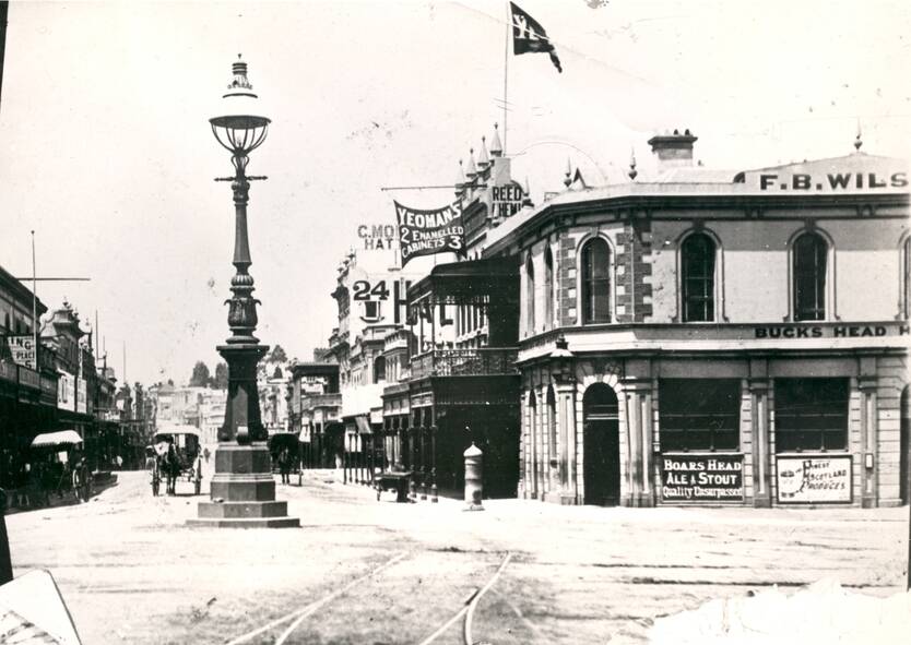 Bridge Mall: The entrance to Bridge Street in the late 1800s. The Buck's Head Hotel is on the right.