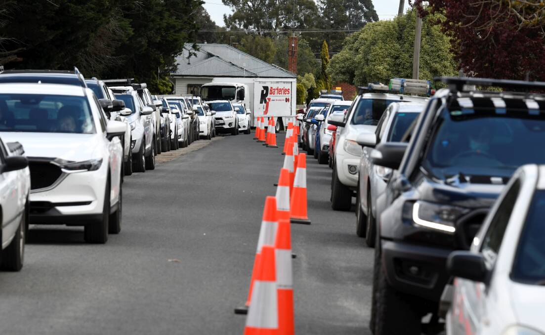 Long but patient wait: Queues of cars with people waiting to be tested in Sebastopol. 
