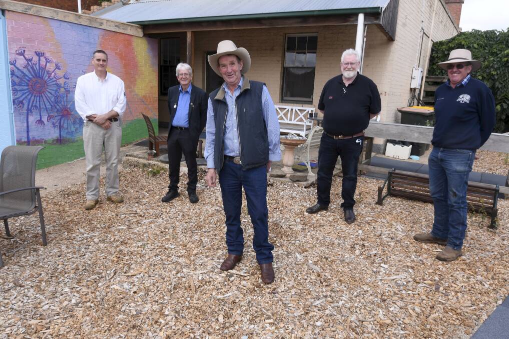 Making a difference to Shannon's Bridge: Dean Recreation Reserve Committee president Brian Maher stands in front of Shannon's Bridge general manager Jeremy McKnight, Hepburn Shire Cr Don Henderson, Elders Insurance's Stephen Crane, and reserve member Robbie Grieve. Picture: Lachlan Bence.