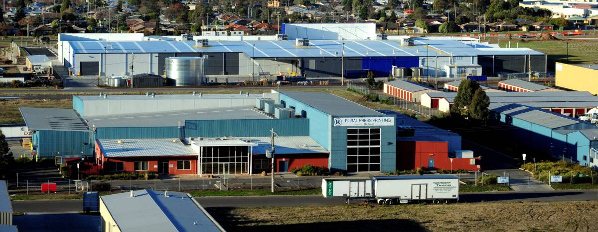 Sold: The former ACM/Rural Press printing site in Grandlee Drive, which has been sold by Colliers for $5.95m. Director David Wright says the Walsh Estate is still growing.