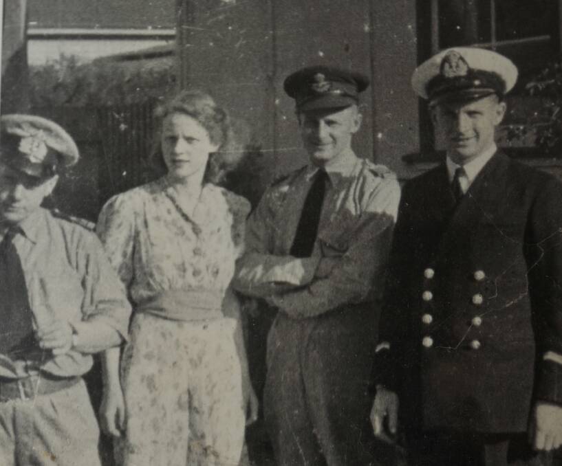 Clarke's mother with her brothers during the war. Lowan Hardy is on the right. Picture: Lachlan Bence.