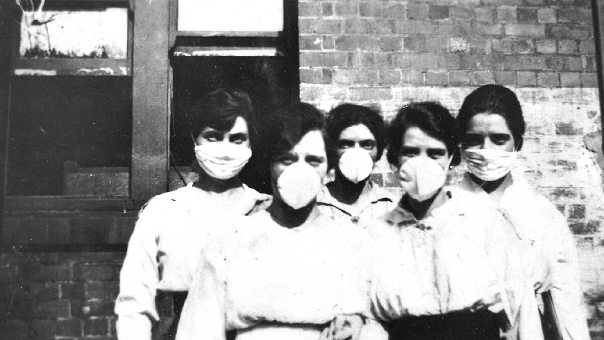 Masks were virtually useless: Nurses outside a Queensland hospital in 1919. Poultices of creosote and eucalyptus were used to try and stem the pandemic.