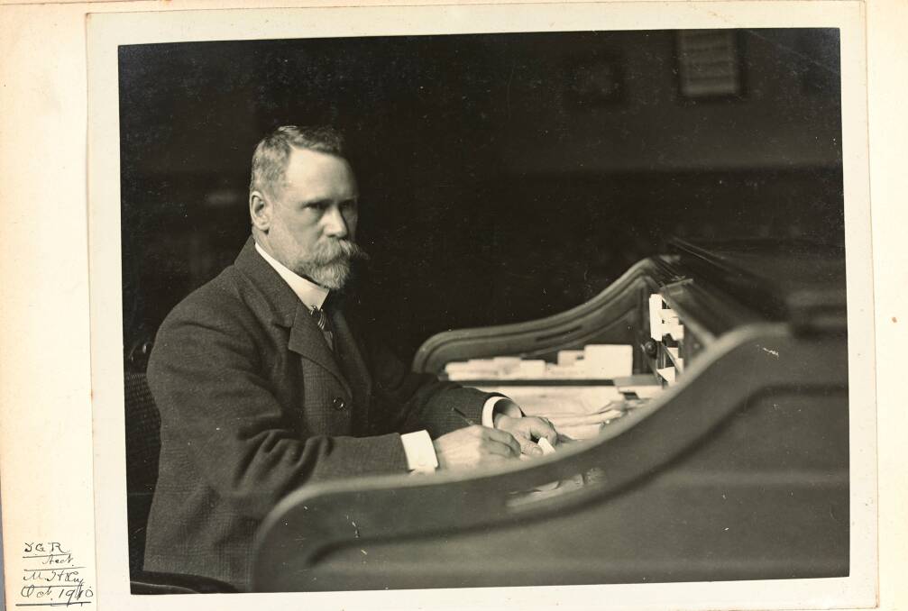 Prodigious worker: J.G. Roberts at his work desk in 1910. Always an avid reader, Roberts threw himself into supporting Melbourne's artists.