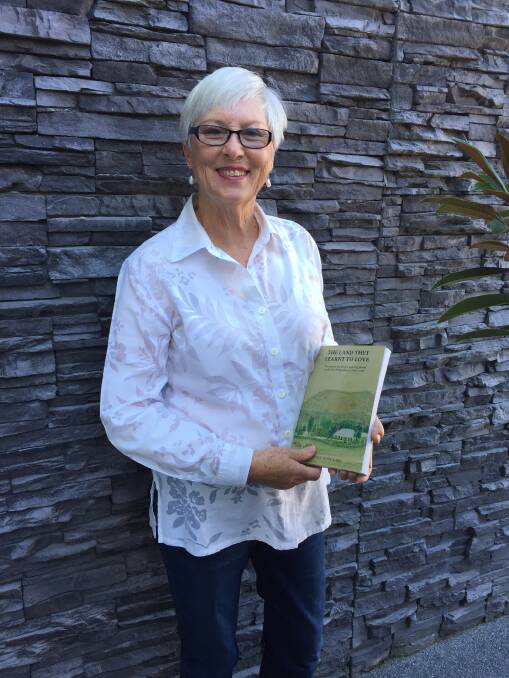 First book: Glenice Wood Lake with 'The Land They Learnt To Love', her book about the settler family Scott of Mt Boninyong. Picture: Caleb Cluff.